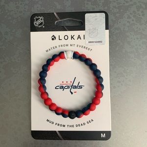 Red, white and blue Lokai bracelet